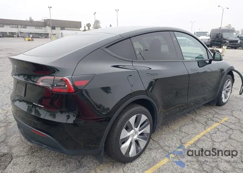 2023 Tesla Model Y Awd/Long Range Dual Motor All-Wheel Drive z USA, uszkodzony, nr VIN 7SAYGDEE8PA152338